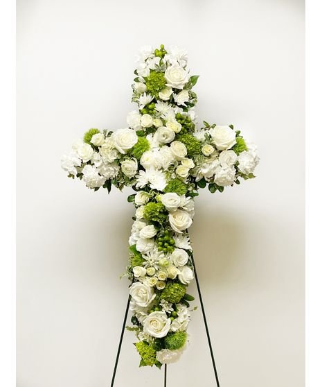 Cruz floral de condolencias en blanco